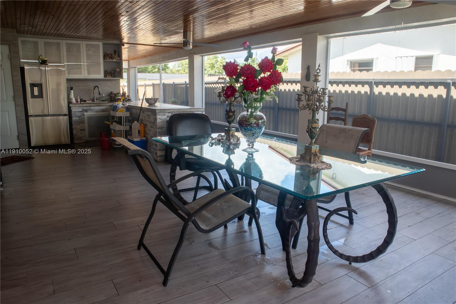 3541 Southwest 105th Court Miami, FL 33165 - Photo 21 of 22 a dining room with furniture and window