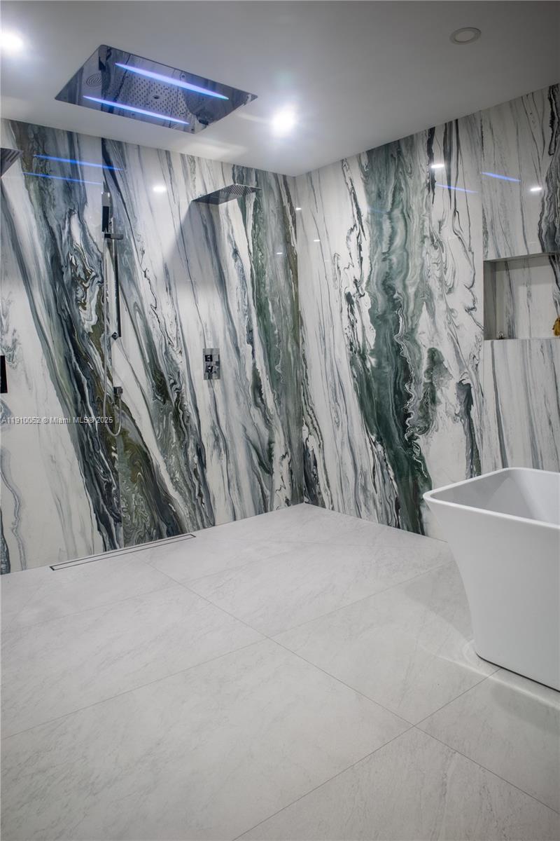 3541 Southwest 105th Court Miami, FL 33165 - Photo 10 of 22 a view of a bathtub in a room