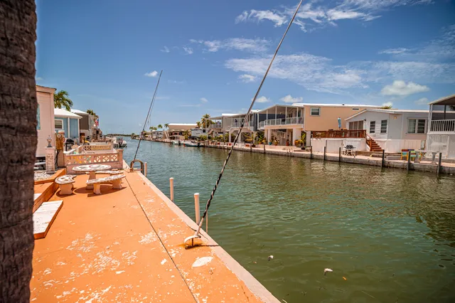 a view of a lake in middle of the house