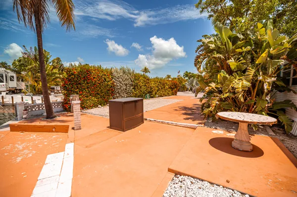 a view of a backyard of the house