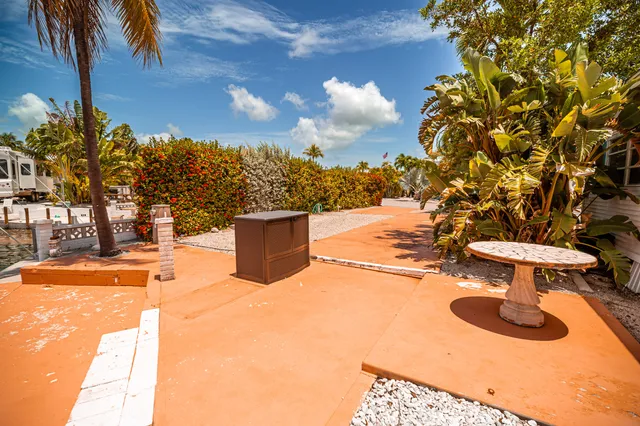 a view of a backyard of the house