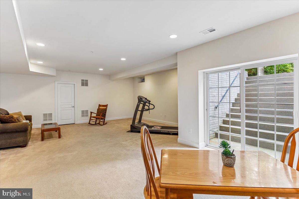 6411 Montgomery Road Elkridge, MD 21075 - Photo 39 of 40 Lower Level Bedroom Suite / Workout Room / Storage