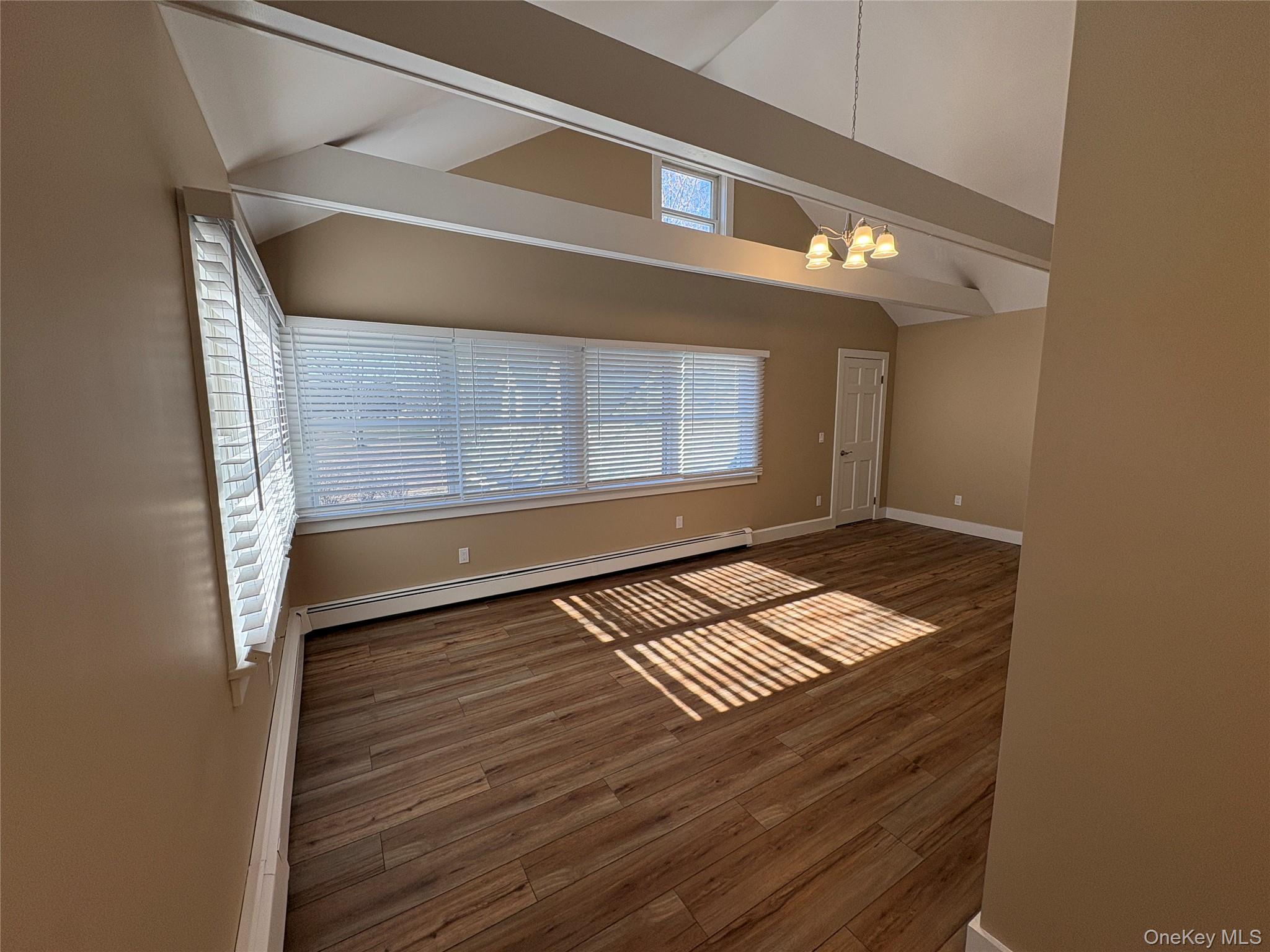 49925 Main Road Southold, NY 11971 - Photo 7 of 17 a view of an empty room with a window