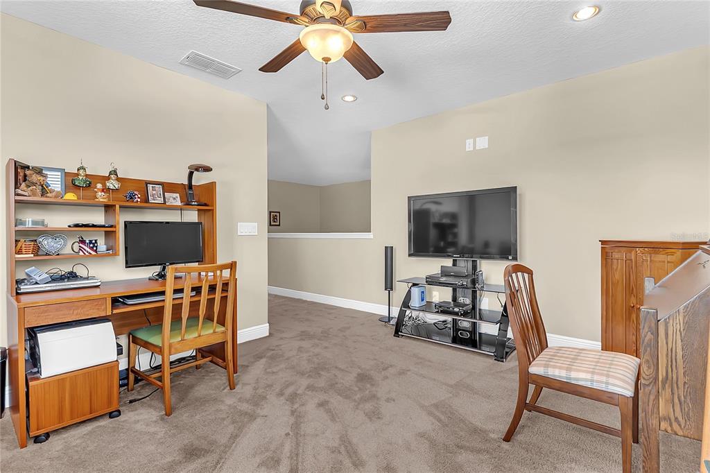 877 Strathmore Drive Orlando, FL 32803 - Photo 24 of 38 a view of a workspace with furniture