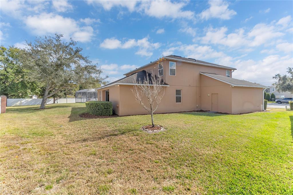 877 Strathmore Drive Orlando, FL 32803 - Photo 33 of 38 a house view with a garden space