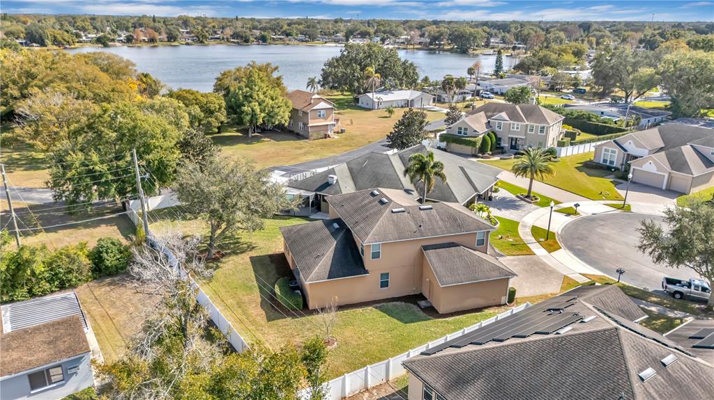 877 Strathmore Drive Orlando, FL 32803 - Photo 37 of 38 a view of a lake with couches and city view
