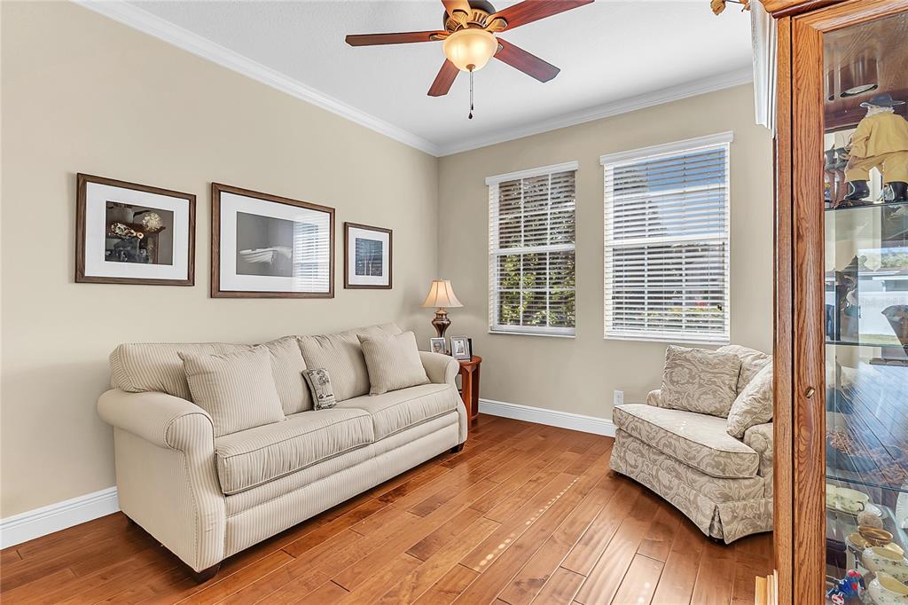 877 Strathmore Drive Orlando, FL 32803 - Photo 9 of 38 a living room with furniture and a large window