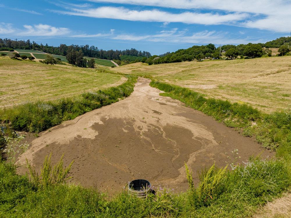 43-acres Sill Road Watsonville, CA 95076 - Photo 12 of 18 a view of an ocean and a mountain