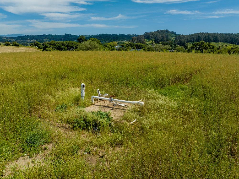 43-acres Sill Road Watsonville, CA 95076 - Photo 10 of 18 a view of a lake with a city
