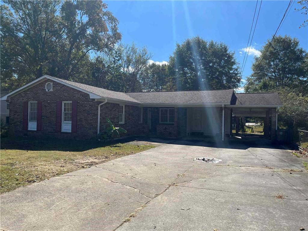 a house with trees in the background