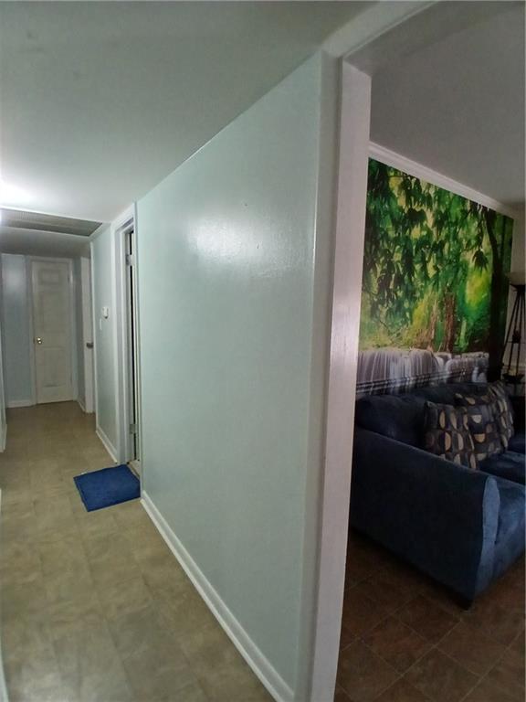 242 Lake Jodeco Road, Unit 242 Jonesboro, GA 30236 - Photo 14 of 45 a living room with furniture and a large window
