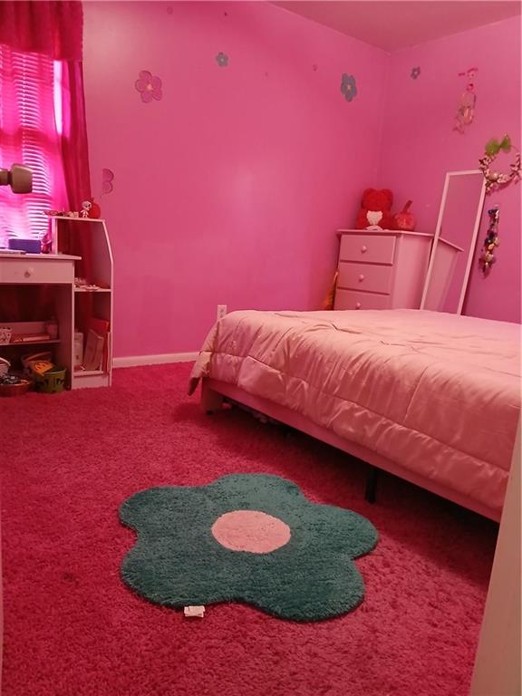 242 Lake Jodeco Road, Unit 242 Jonesboro, GA 30236 - Photo 29 of 45 a bed room with a bed and a fireplace