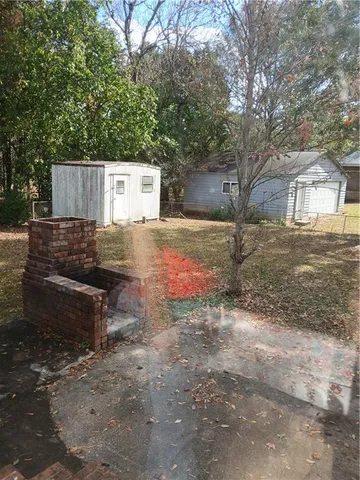 a room with cabinets and painting on the wall