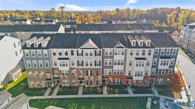 an aerial view of multi story residential apartment building