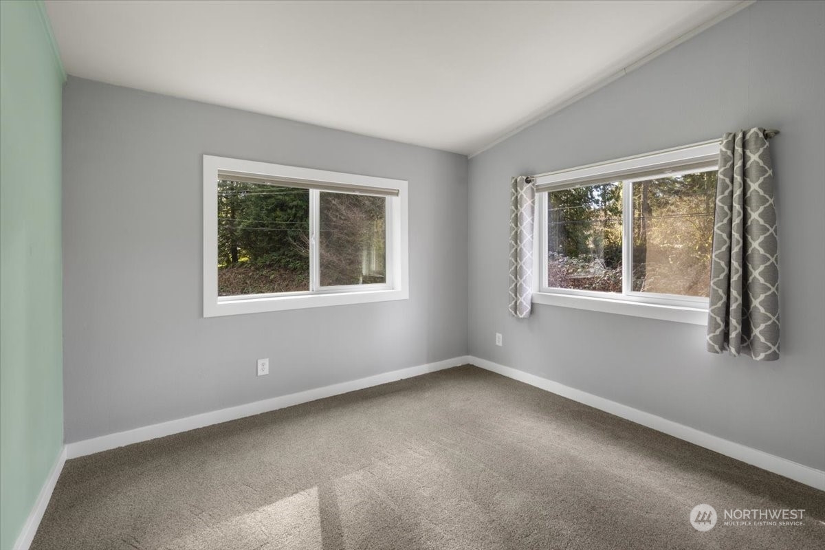 815 Carlson Road Snohomish, WA 98290 - Photo 16 of 21 a view of an empty room with a window