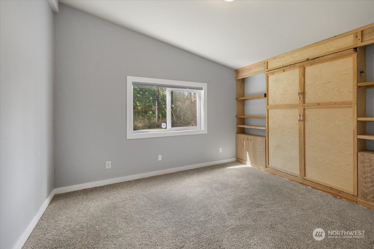 815 Carlson Road Snohomish, WA 98290 - Photo 19 of 21 an empty room with windows and closet