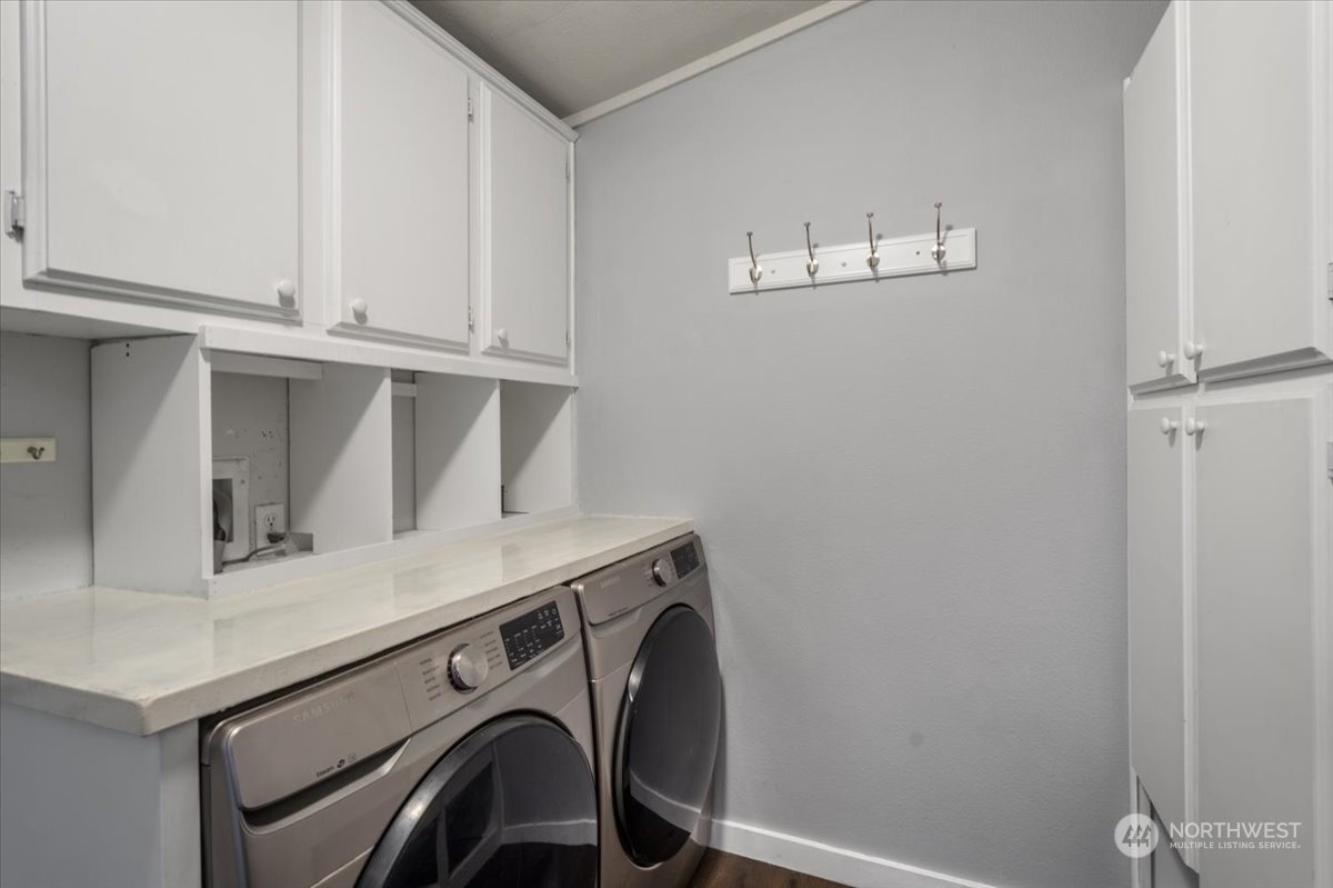 815 Carlson Road Snohomish, WA 98290 - Photo 21 of 21 a utility room with dryer and washer