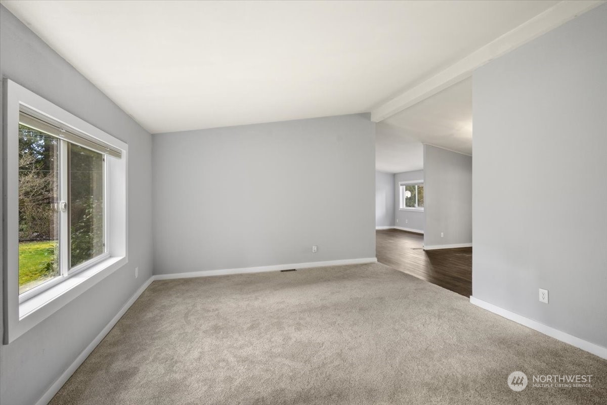 815 Carlson Road Snohomish, WA 98290 - Photo 8 of 21 an empty room with windows