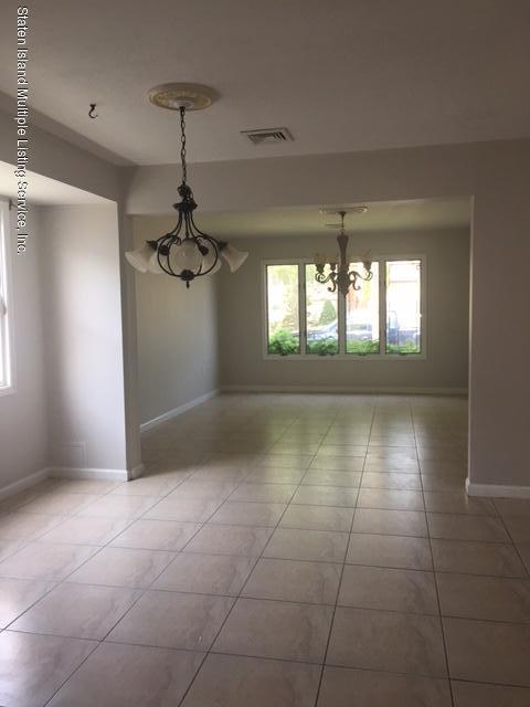 50 Beacon Place Staten Island, NY 10306 - Photo 12 of 28 a view of a windows and chandelier in a room