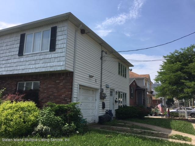 50 Beacon Place Staten Island, NY 10306 - Photo 4 of 28 a view of house with yard