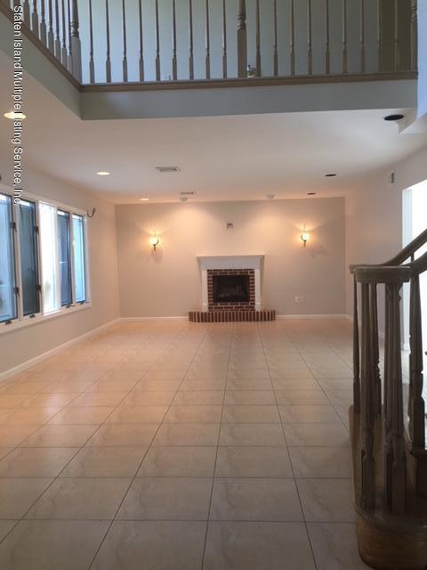50 Beacon Place Staten Island, NY 10306 - Photo 7 of 28 a view of an empty room and fire place