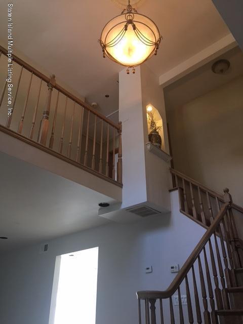 50 Beacon Place Staten Island, NY 10306 - Photo 10 of 28 a view of entryway and hall with wooden floor