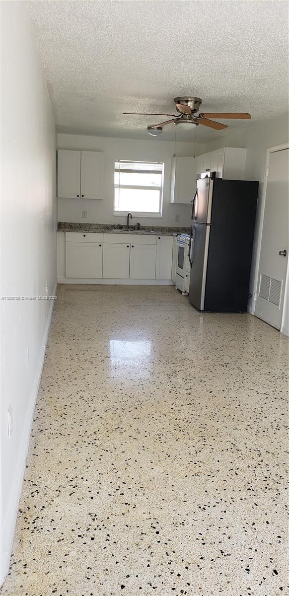 Little River Miami, FL 33138 - Photo 7 of 10 a view of a livingroom with wooden floor