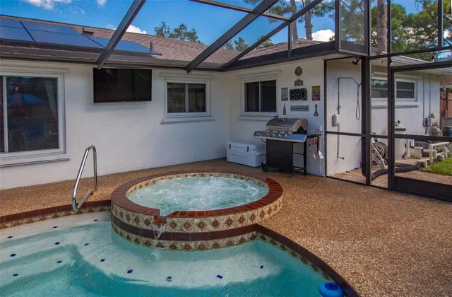 a view of a livingroom with furniture and a fireplace