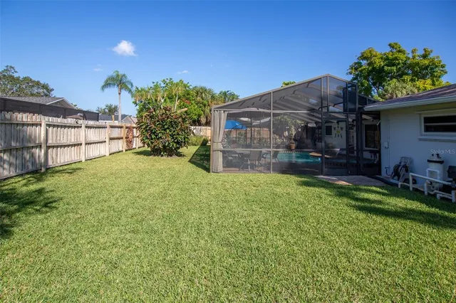 a view of a backyard with a garden