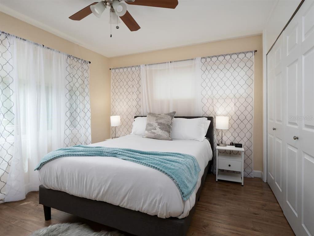 1425 Northeast 13th Street Gainesville, FL 32601 - Photo 5 of 20 a bedroom with a bed and a window