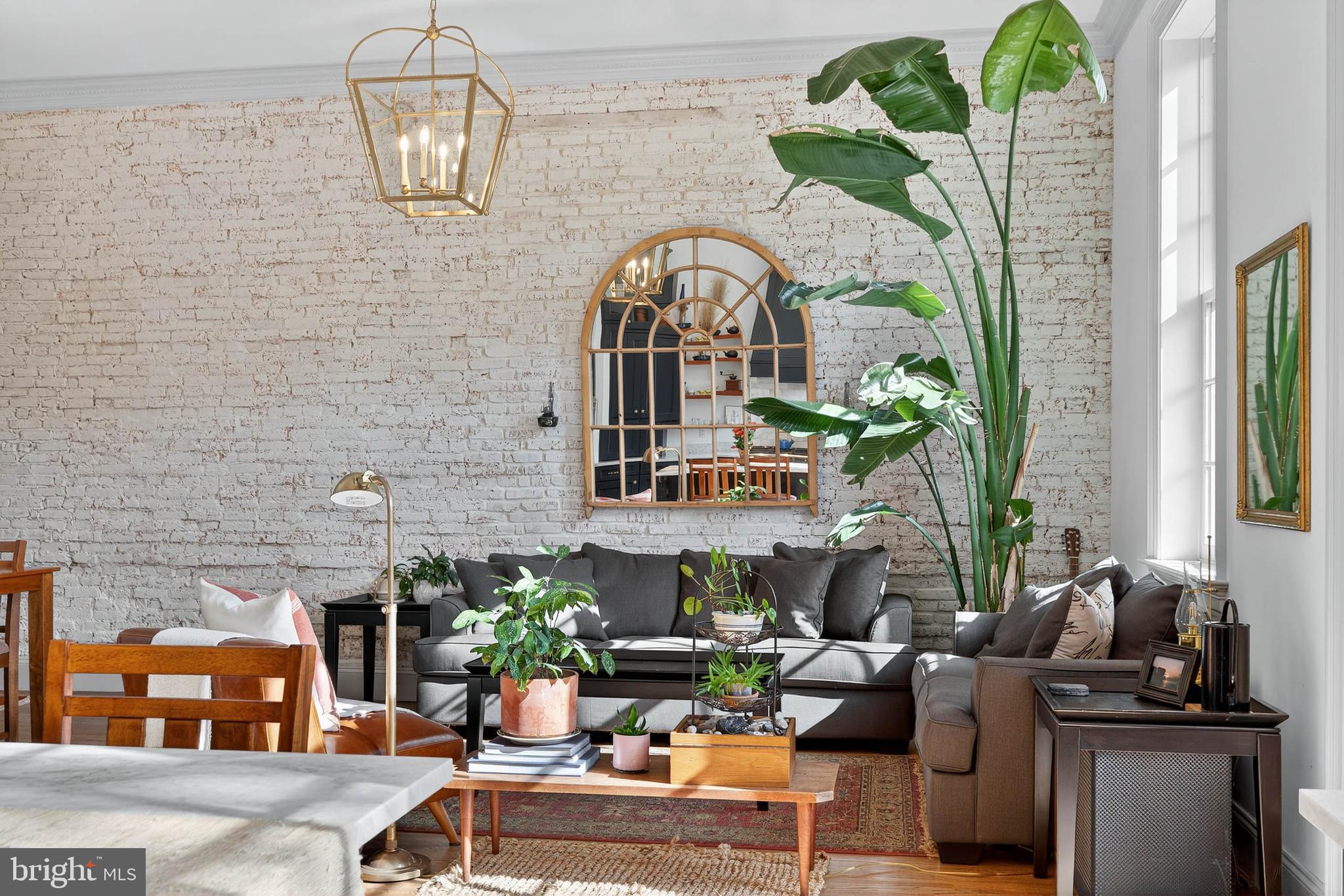 14 East Farnum Street Lancaster, PA 17602 - Photo 25 of 50 a living room with furniture chandelier and a fireplace