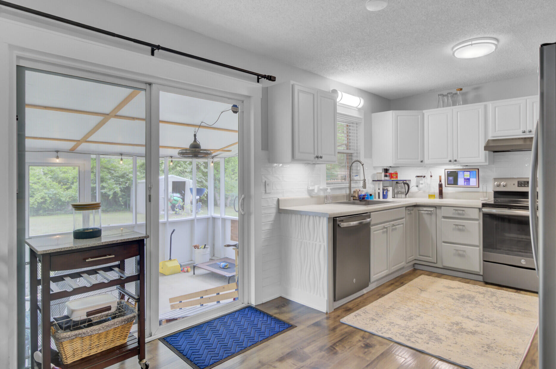 296 Oxford Road Ladson, SC 29456 - Photo 16 of 44 Kitchen to Screened Porch