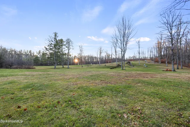 a backyard of apartments with trees