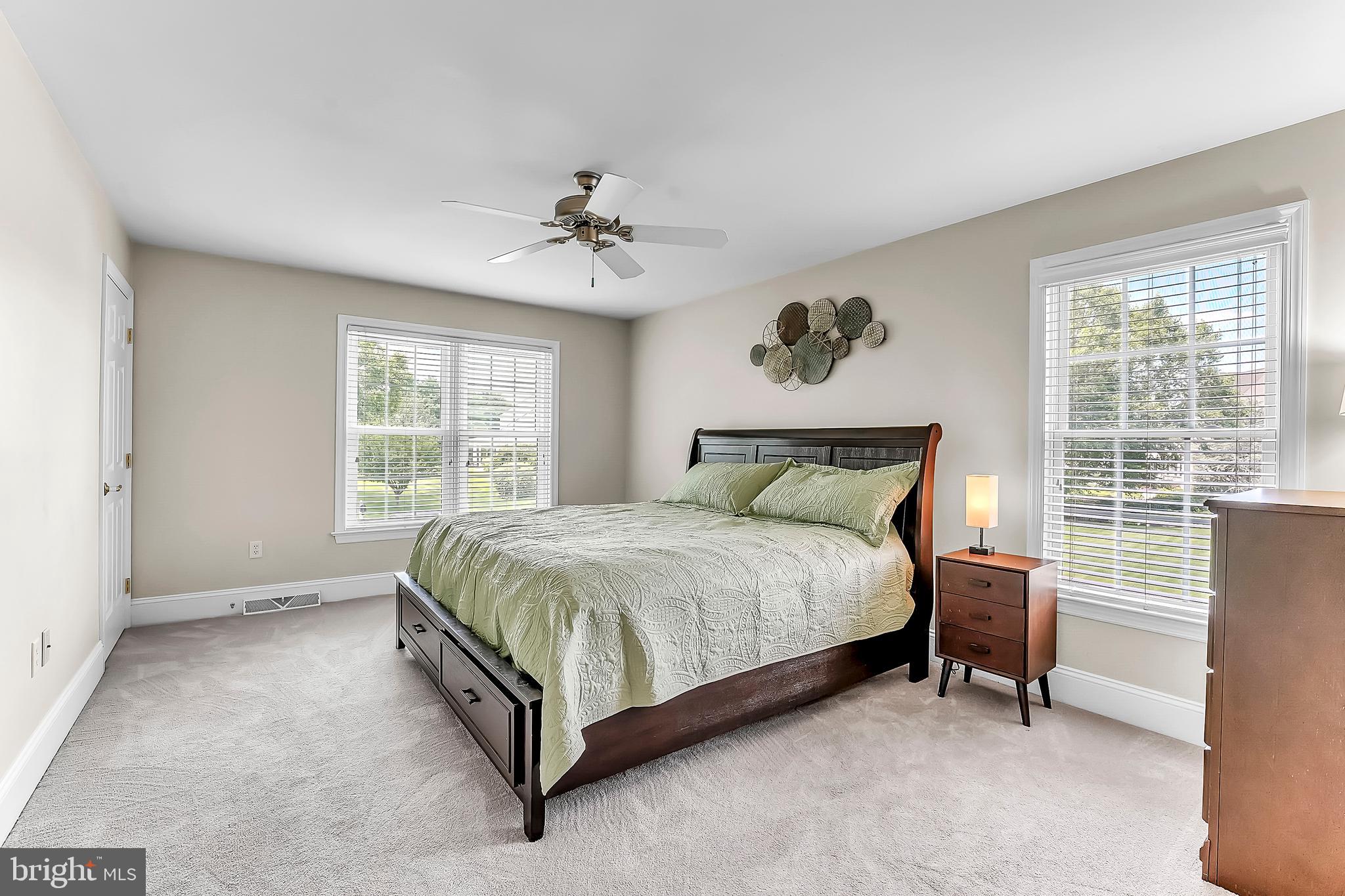 961 Buckwalter Road Lititz, PA 17543 - Photo 22 of 38 a large bed sitting in a bedroom next to a window