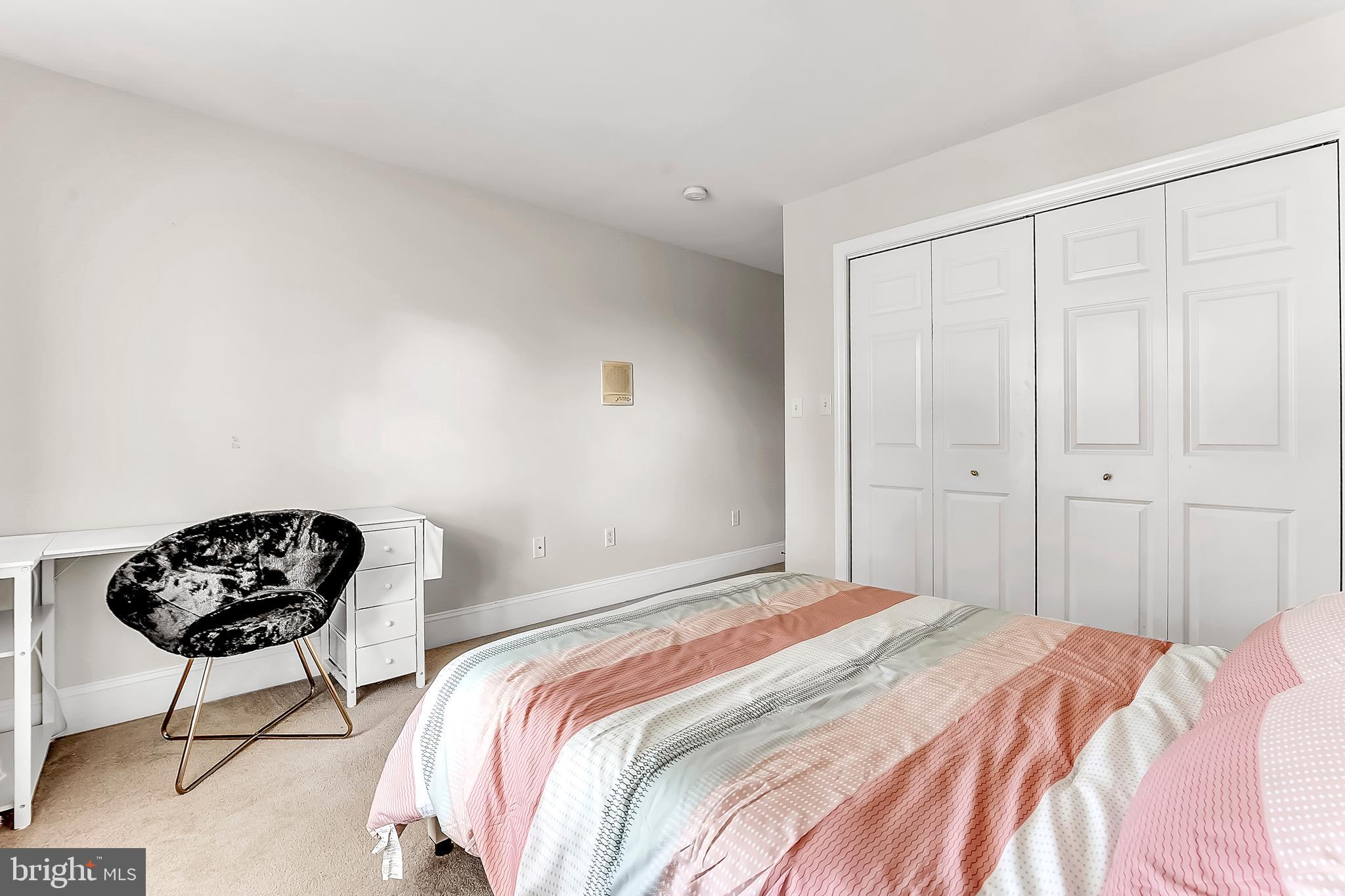 961 Buckwalter Road Lititz, PA 17543 - Photo 26 of 38 a bedroom with a bed and a chair
