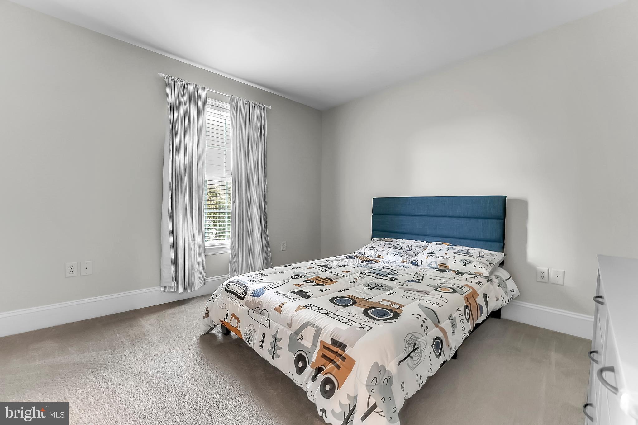 961 Buckwalter Road Lititz, PA 17543 - Photo 30 of 38 a bedroom with a bed and large window
