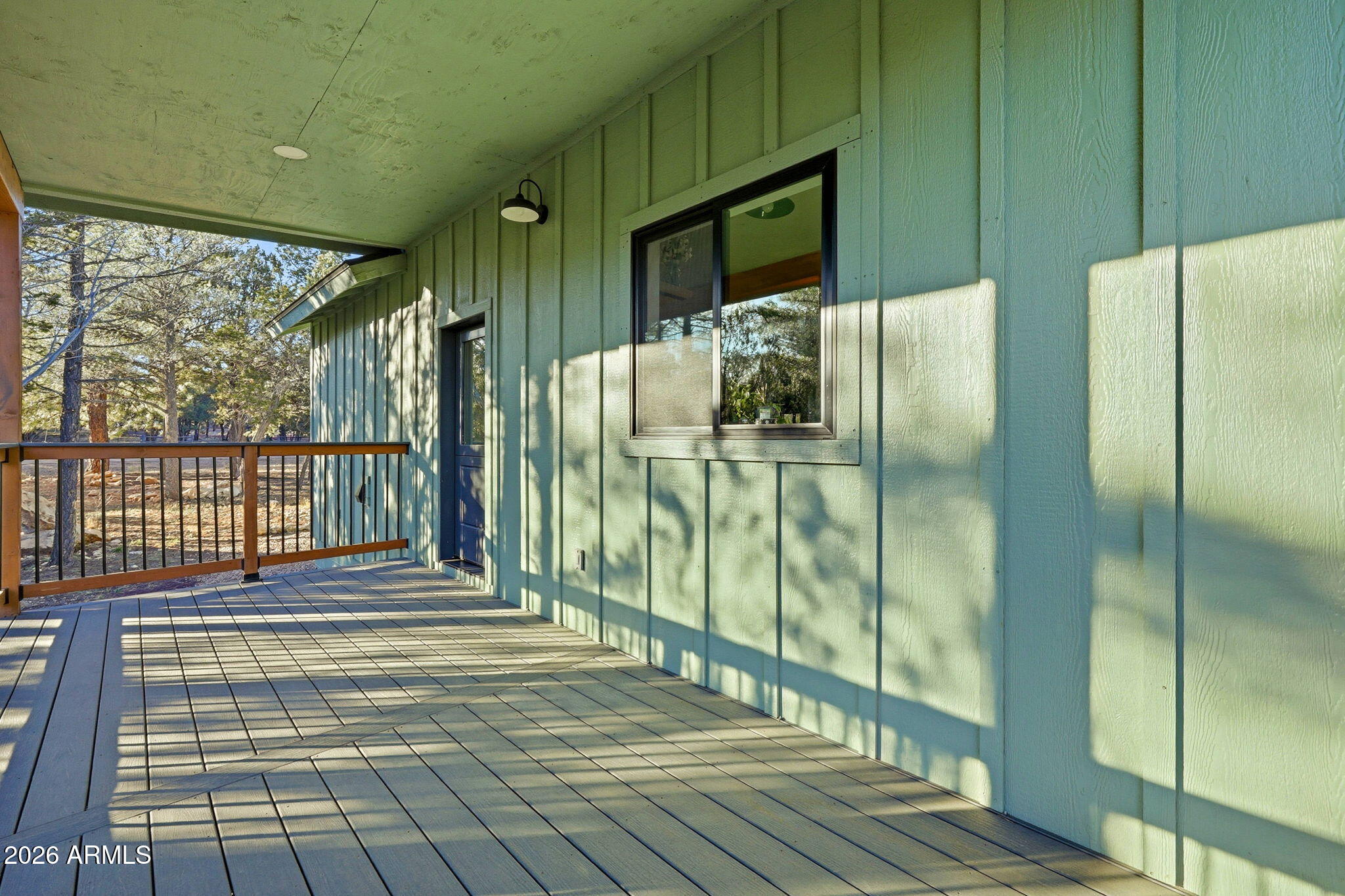 2225 Roundabout Way Overgaard, AZ 85933 - Photo 20 of 32 a view of a balcony from door