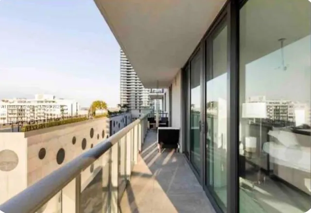 a view of a city skyline from a balcony