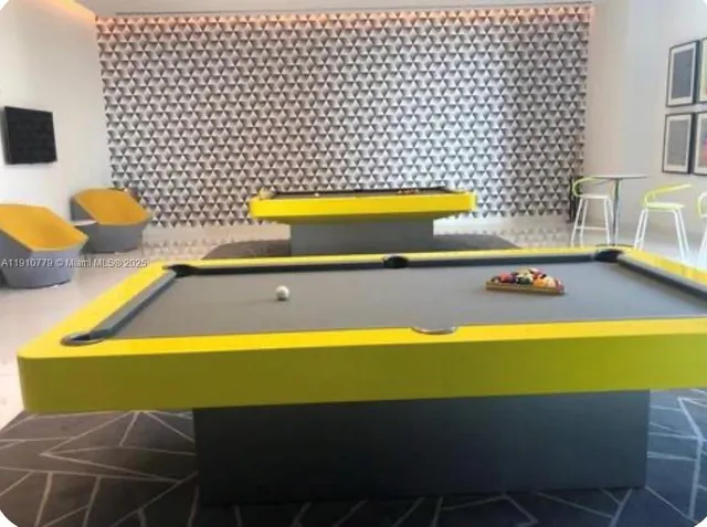 a view of a porch with chairs and backyard