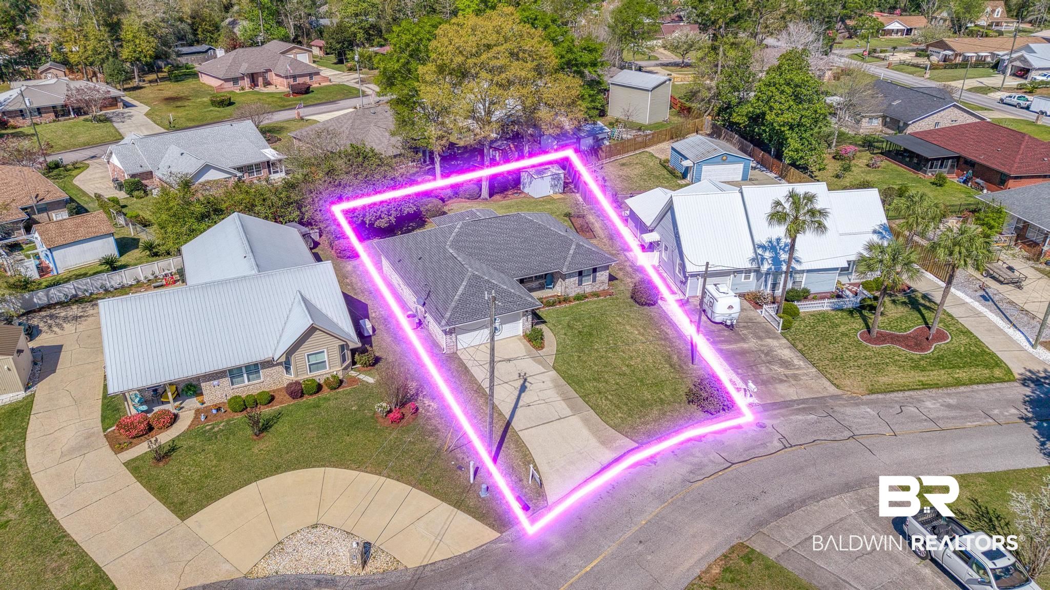 2881 Eslava Circle Lillian, AL 36549 - Photo 34 of 58 Aerial view of residential area with property boundaries highlighted