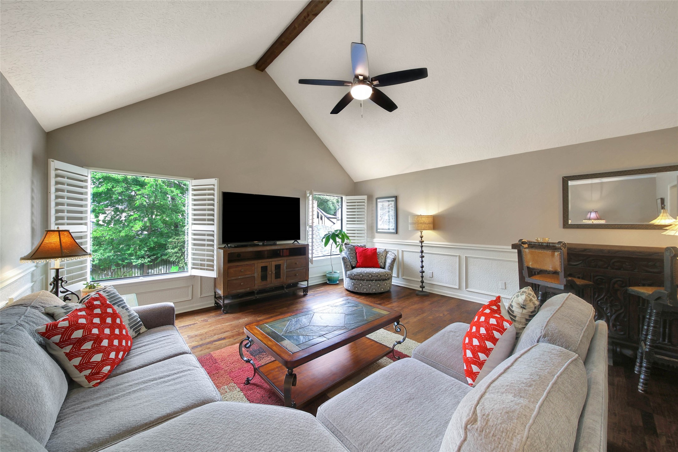 17007 Windrow Drive Spring, TX 77379 - Photo 27 of 46 a living room with furniture and a flat screen tv