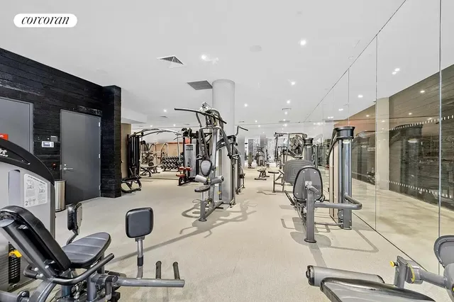 a view of a patio with a table and chairs