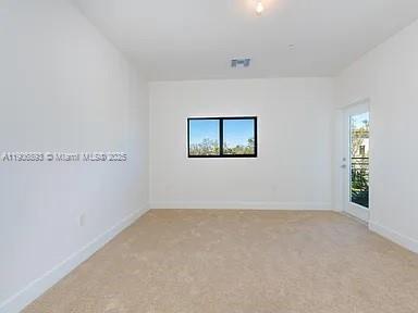 4500 Northwest 8th Place Plantation, FL 33317 - Photo 13 of 31 an empty room with windows