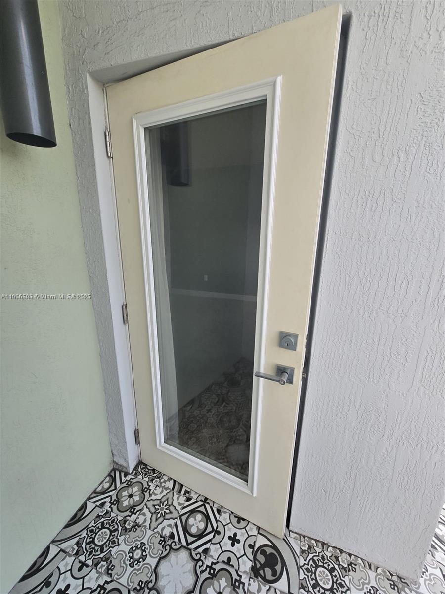 4500 Northwest 8th Place Plantation, FL 33317 - Photo 15 of 31 a bathroom with a glass door shower
