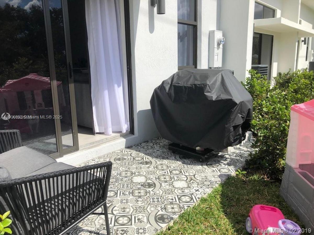 4500 Northwest 8th Place Plantation, FL 33317 - Photo 10 of 31 a view of balcony with patio