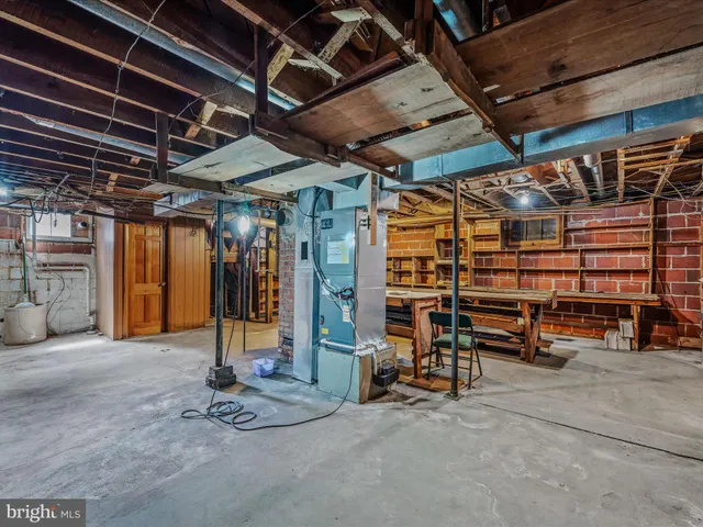 a view of empty room with wooden ceiling