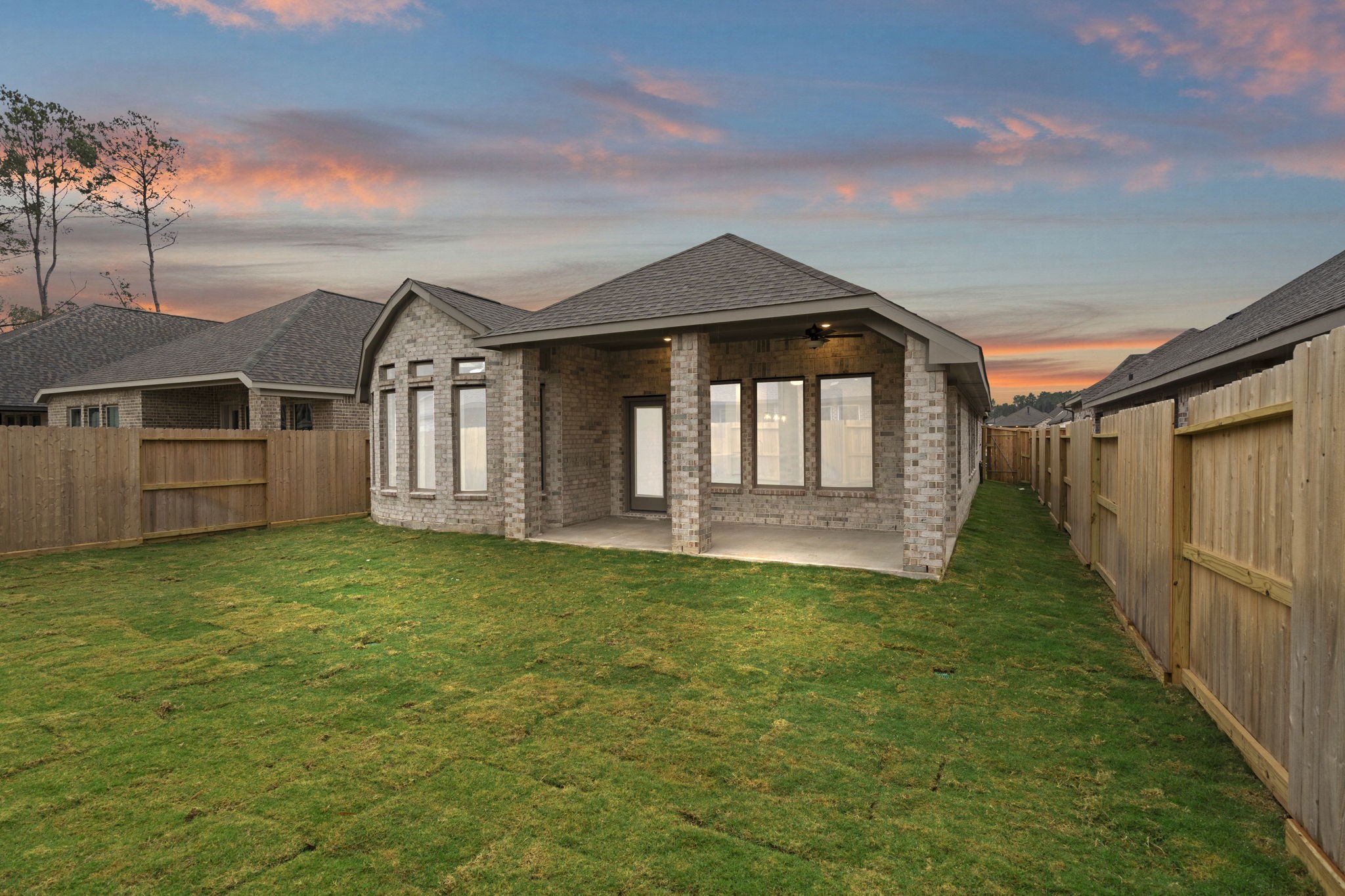 9519 Sierra Crest Lane Porter, TX 77365 - Photo 22 of 35 a front view of a house with a garden