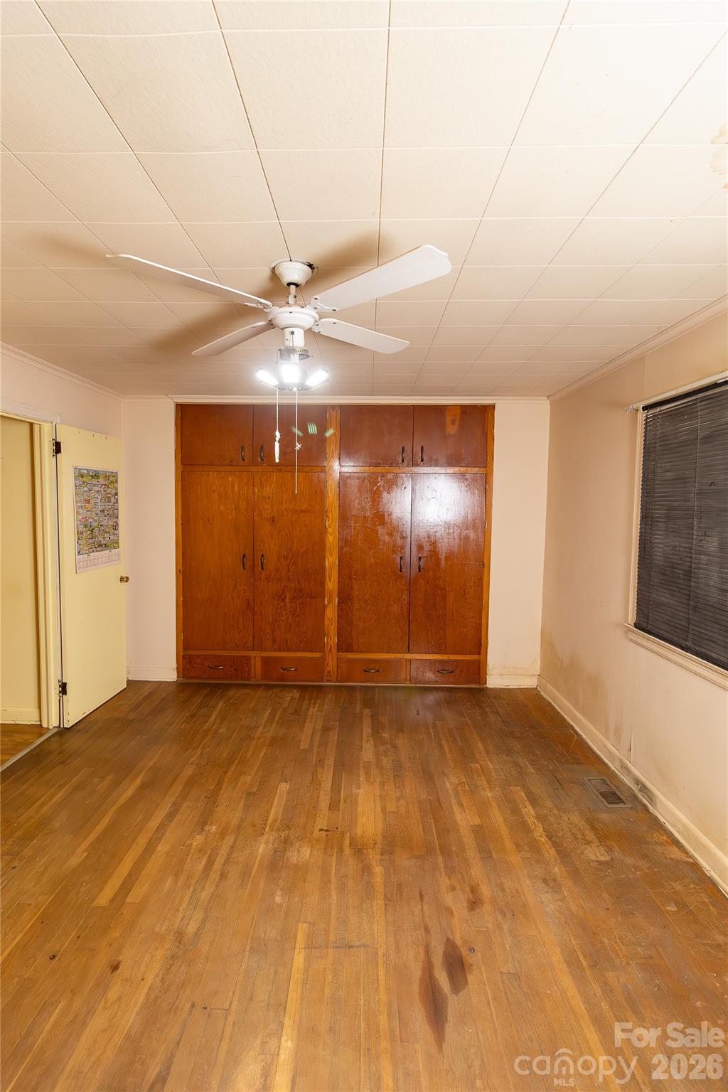 609 Wilcox Avenue Gaffney, SC 29341 - Photo 22 of 23 a view of an empty room with window and a kitchen view