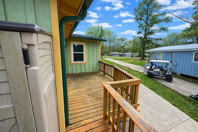 a view of a balcony with furniture