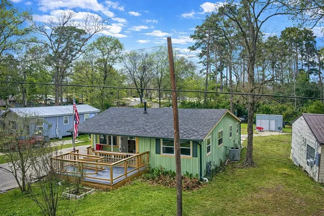 an aerial view of a house with garden
